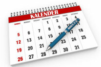 Kalenderblatt, auf dem ein Stift liegt 